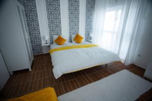 Postel nebo postele na pokoji v ubytování AG Apartment Gabčíkovo