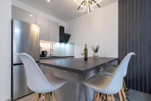 Kuchyň nebo kuchyňský kout v ubytování Apartments Angelus