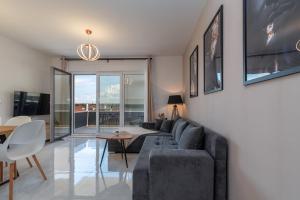 TV a/nebo společenská místnost v ubytování Apartments Angelus