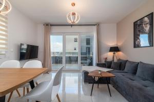 TV a/nebo společenská místnost v ubytování Apartments Angelus