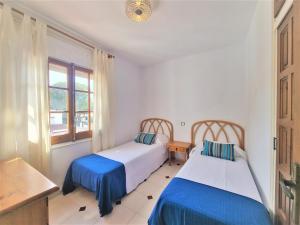 Posteľ alebo postele v izbe v ubytovaní Holiday Home Betty + 23 fotografií