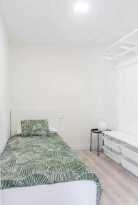 Posteľ alebo postele v izbe v ubytovaní Apartamento Roncudo 1º planta
