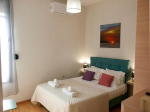 A bed or beds in a room at Chania Olive Home Még 25 kép