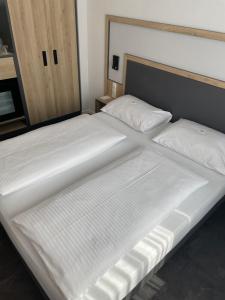 Stadthotel Hamburgにあるベッド