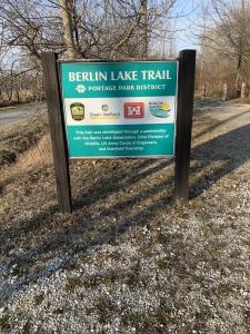 a sign on the side of a road at Prairie House RV Spaces in Deerfield