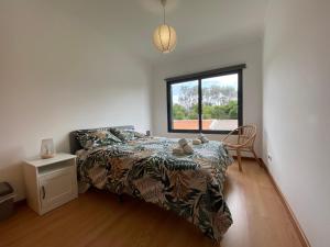 Postel nebo postele na pokoji v ubytování Casa da Estrela