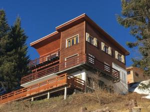 a large house on top of a hill at Appartement Chamrousse, 4 pièces, 8 personnes - FR-1-340-232 in Chamrousse