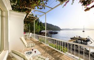 a balcony with a view of the water at Villa Ruyam in Marmaris