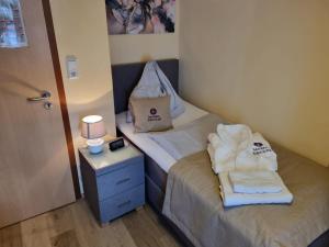 Voodi või voodid majutusasutuse Gasthaus Hinterbrühl toas