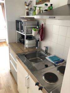 Kuchyň nebo kuchyňský kout v ubytování Fachwerkhaus Hartmann