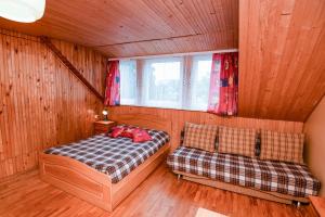 Ένα ή περισσότερα κρεβάτια σε δωμάτιο στο Ersita