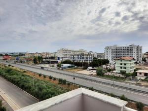 a view of a highway in a city with buildings at Arlis House in Golem