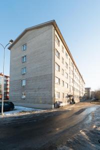 a large building on the side of a street at Tallinn Oasis Studios by RevalHome in Tallinn