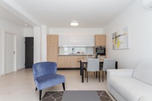 Kuchyň nebo kuchyňský kout v ubytování Supreme Apartment Miramare with Sea View