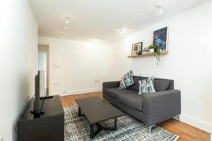 Khu vực ghế ngồi tại London Flat with Garden WPRA