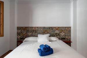 Posteľ alebo postele v izbe v ubytovaní Casa carpa andalucia I