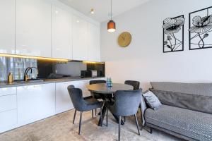 Η κουζίνα ή μικρή κουζίνα στο Laguna Beskidów Resort - Apartament A54