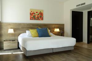 Cama ou camas em um quarto em Mod Hotels Mendoza