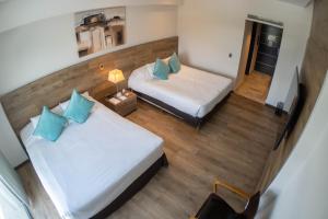 Cama ou camas em um quarto em Mod Hotels Mendoza