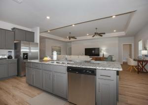 a kitchen with a sink and a counter top at Sweet Escapes House in Foley