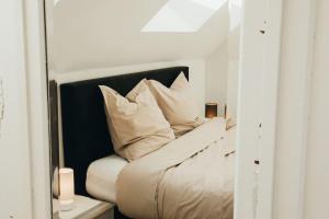 Letto o letti in una camera di Duplex 6P Le Perron Theux