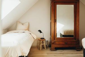 Letto o letti in una camera di Duplex 6P Le Perron Theux