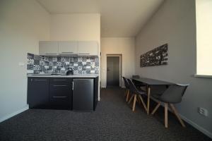 Eldhús eða eldhúskrókur á Replay apartmány