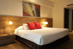 Cama ou camas em um quarto em Mod Hotels Mendoza