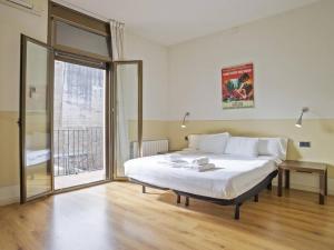 Posteľ alebo postele v izbe v ubytovaní ¡Apartamento en el centro de Barcelona!