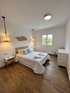 Postel nebo postele na pokoji v ubytování Apartamento en Costamar I, 2ª Planta, 23