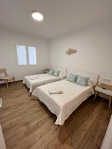 Postel nebo postele na pokoji v ubytování Apartamento en Costamar I, 2ª Planta, 23