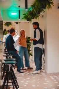 a group of people standing in a room at Millennium Hub & Hotel in Constanţa