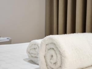 Cama ou camas em um quarto em Sea Front Villa
