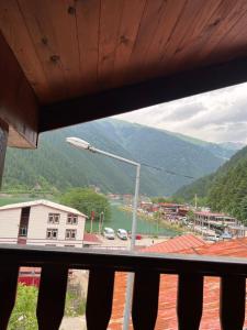 a view of a river from a balcony with a street light at ZEREN APART 2 CENTRUM in Uzungöl