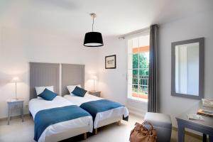 Postel nebo postele na pokoji v ubytování Lagrange Vacances - Le Clos Savornin + 18 fotografií