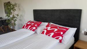 Rúm í herbergi á Replay apartmány