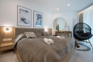 מיטה או מיטות בחדר ב-Apartament Premium PINEA 205