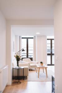 a living room with a couch and a table at San Bernardo, 19 in Avilés