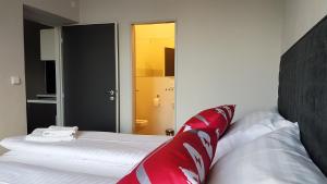 Rúm í herbergi á Replay apartmány