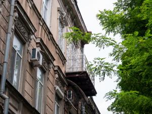a balcony on the side of a building at Hotel Madrid in Odesa