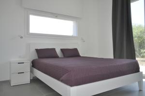 Un pat sau paturi într-o cameră la Casa Solà