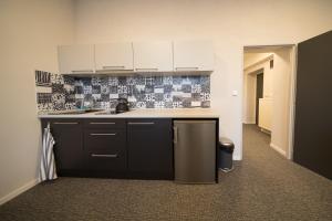 Eldhús eða eldhúskrókur á Replay apartmány