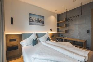 Posteľ alebo postele v izbe v ubytovaní Thalhof Apartments
