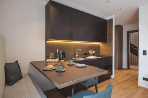 Kuchyňa alebo kuchynka v ubytovaní Thalhof Apartments