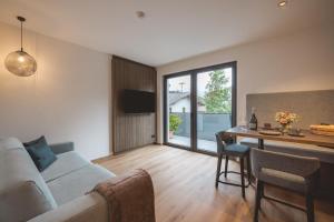 TV a/nebo společenská místnost v ubytování Thalhof Apartments