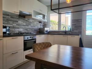 Kuchyň nebo kuchyňský kout v ubytování Boutique Hotel Huys van Leyden