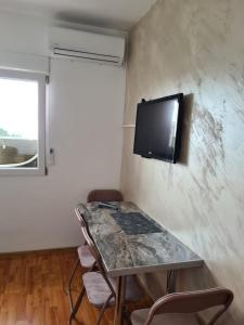 TV a/nebo společenská místnost v ubytování Good Inn