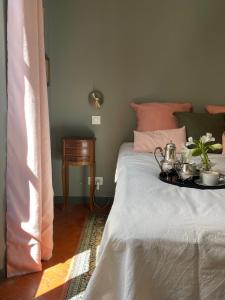 Postel nebo postele na pokoji v ubytování La Maison