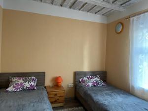 A bed or beds in a room at Ostsee Apartments