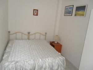 A bed or beds in a room at Case Vacanza Lampedusa